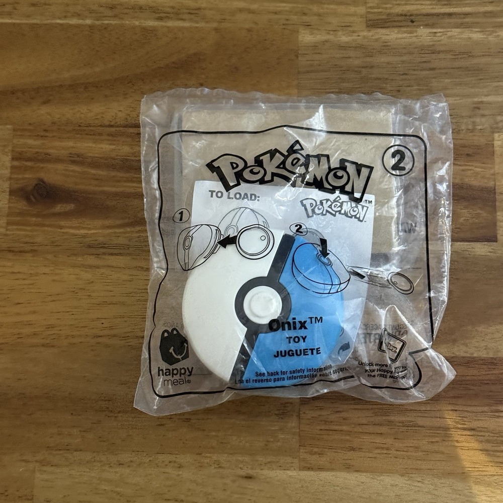 Sealed 2019 McDonald's Happy Meal Onix #1 Pokemon Shooter w/ Holo Exeggutor